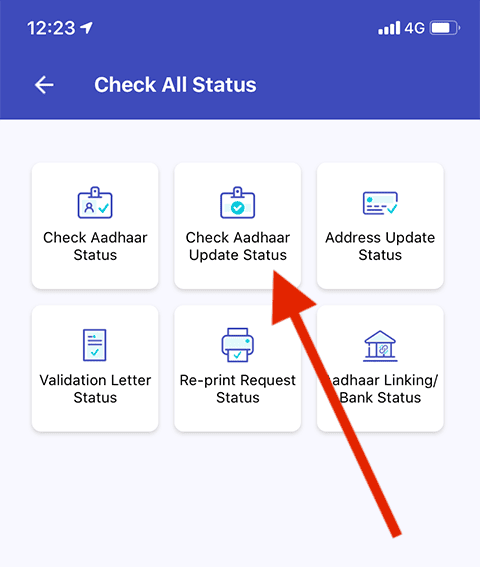 Arrow pointing towards "Enrolment & Update Status" option on mAaddhar App