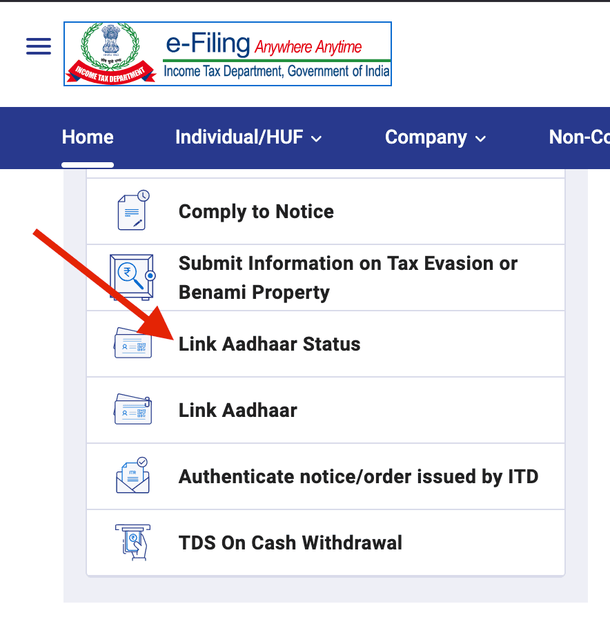 Screenshot of the incometax.gov.in homepage with an arrow pointing to the "Link Aadhaar Status" option in the Quick Links section
